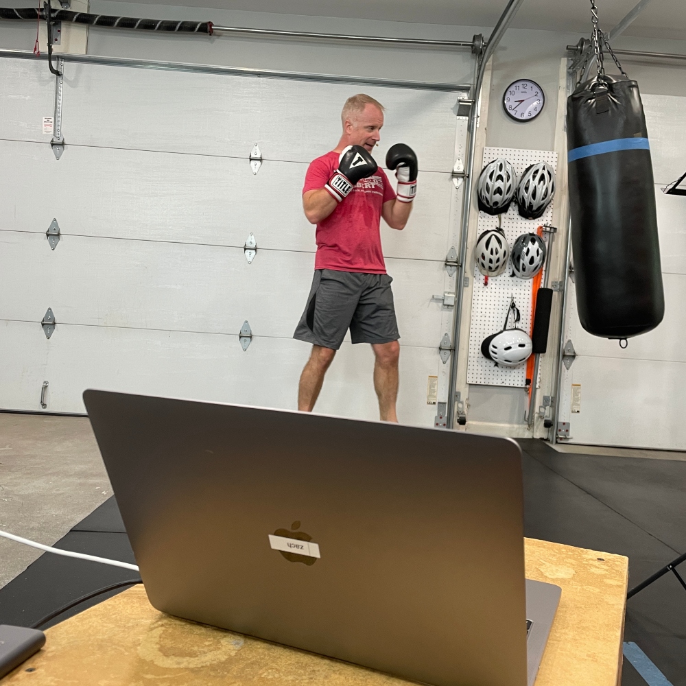 knoxville boxing instructor taping an online boxing class