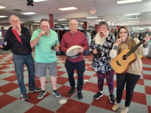 class of individuals at Music therapy for parkinson's sufferers